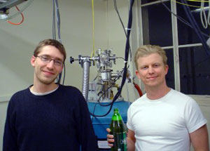 an image of an old friend Sean Garner and colleague in their MRFM lab and sean is holding a 40 oz. of Mickey's