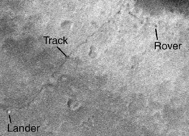 an image taken by the Mars Global Surveyor spacecraft (orbiting Mars) of the tracks made by the Spirit rover, the lander and even the rover itself!