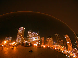 image of yuri taking a picture of Chicago's bean